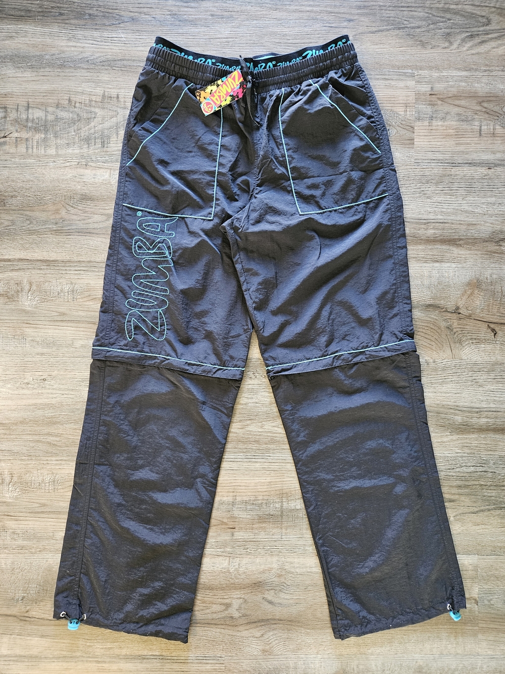 Zumba Fitness Men's Black Zip It Convertible Cargo Pants With Teal Embroidery - Picture 2 of 14